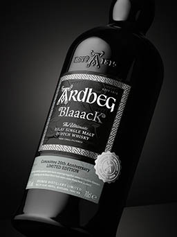 Black background Explorer of Ardbeg BlaaacK whisky bottle