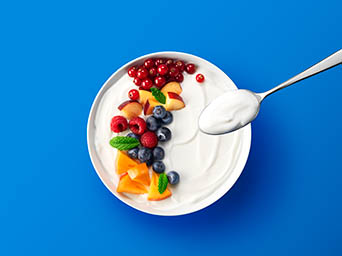 Coloured background Explorer of Koko yoghurt breakfast bowl