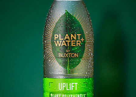 Coloured background Explorer of Buxton plant water bottle