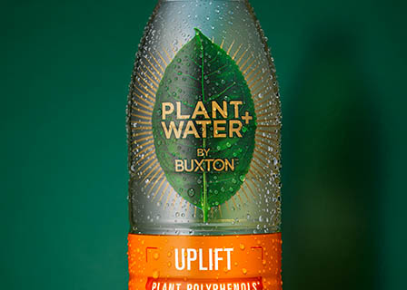 Coloured background Explorer of Buxton plant water bottle