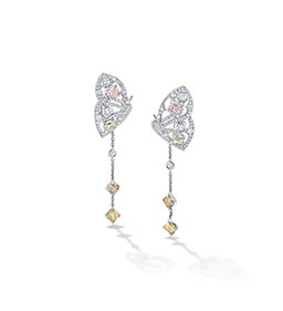 Fine jewellery Explorer of Boodles platinum earrings with diamonds and sapphire