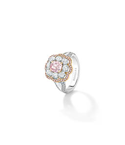 Fine jewellery Explorer of Boodles platinum ring with diamonds and sapphire