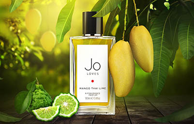 Coloured background Explorer of Jo Loves Mango Thai Lime fragrance bottle