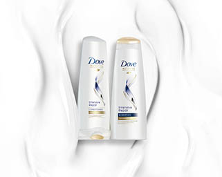 Skincare Explorer of Dove shampoo and conditioner bottles with texture