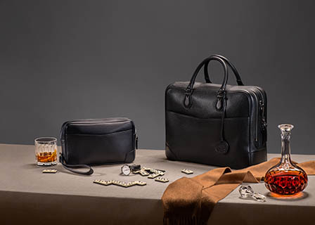Fashion Photography of Alfred Dunhill leather briefcase and pouch
