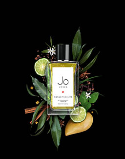 Black background Explorer of Jo Loves Mango Thai Lime fragrance bottle