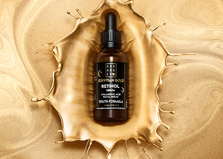 Creative still life product Photography of Grounded serum bottle in gold splash