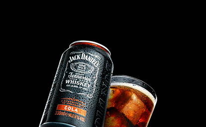 Drinks Photography of Jack Daniel's can and server
