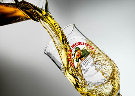 Drinks Photography of Birra Moretti pint pour