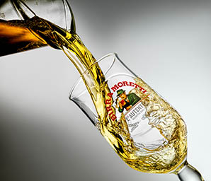 Drinks Photography of Birra Moretti pint pour